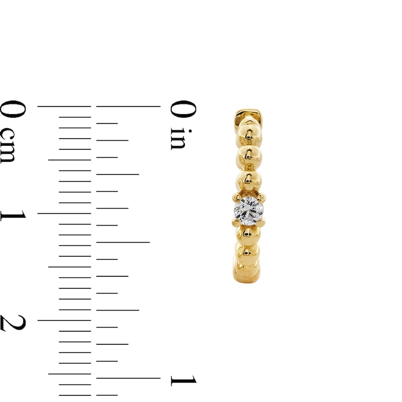 Main Image 3 of 1/8 CT. T.W. Diamond Solitaire Beaded Hoop Earrings in 10K Gold