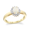 Thumbnail Image 1 of Oval Opal and 1/5 CT. T.W. Diamond Alternating Sunburst Frame Ring in 10K Gold