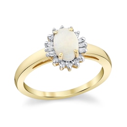 Oval Opal and 1/5 CT. T.W. Diamond Alternating Sunburst Frame Ring in 10K Gold