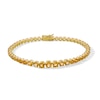 Thumbnail Image 1 of Graduated Citrine Tennis Bracelet in Sterling Silver with 18K Gold Plate - 7.25&quot;