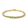 Thumbnail Image 1 of Graduated Peridot Tennis Bracelet in Sterling Silver with 18K Gold Plate - 7.25&quot;