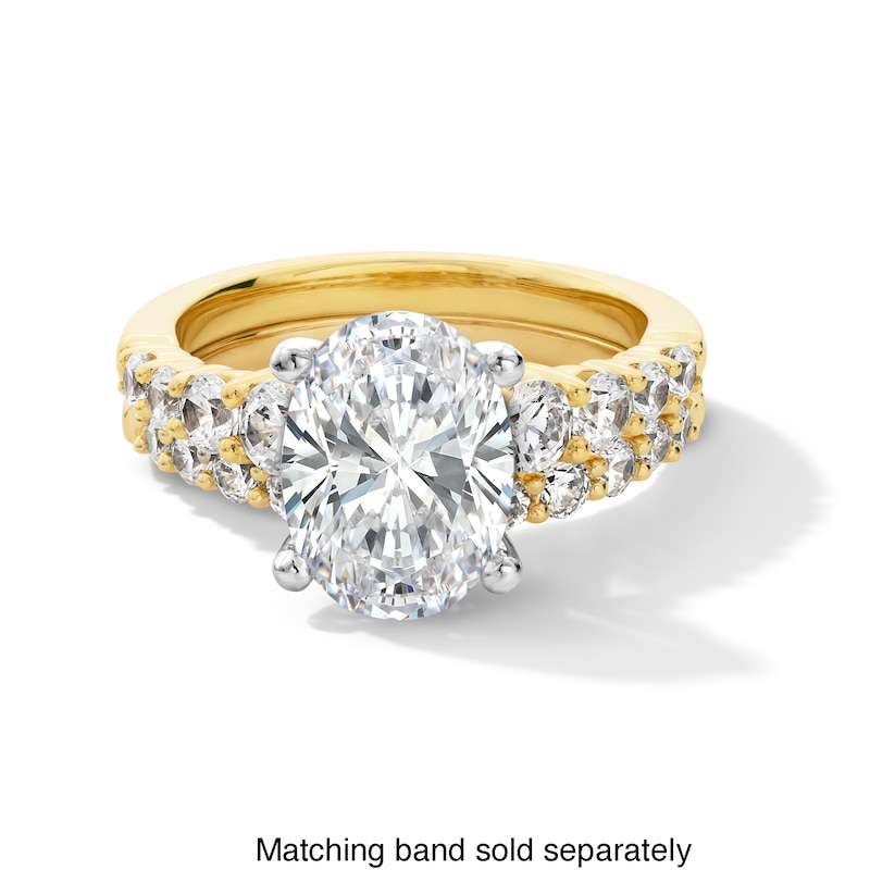 Main Image 4 of 3-3/4 CT. T.W. Oval Certified Lab-Created Diamond Graduated Shank Engagement Ring in 14K Gold (I/SI2)