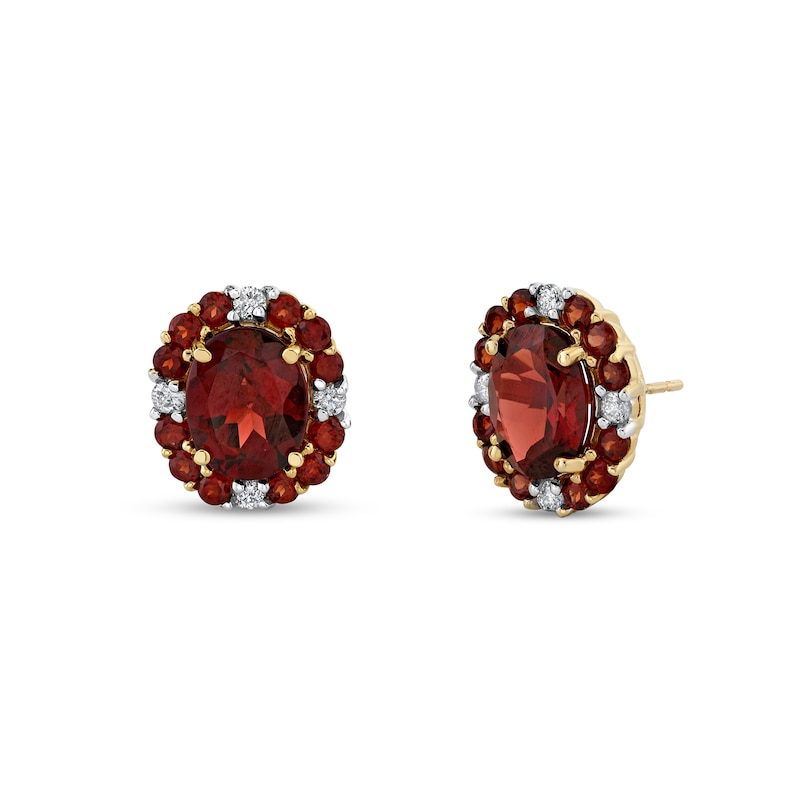 Main Image 1 of Oval and Round Garnet with 1/4 CT. T.W. Diamond Scallop Frame Stud Earrings in 10K Gold