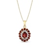 Thumbnail Image 1 of Oval and Round Garnet with 1/6 CT. T.W. Diamond Double Frame Pendant in 10K Gold