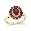 Thumbnail Image 1 of Oval and Round Garnet with 1/6 CT. T.W. Diamond Double Frame Ring in 10K Gold