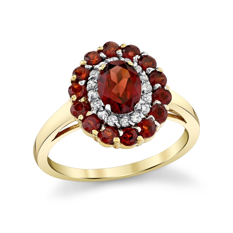 Main Image 1 of Oval and Round Garnet with 1/6 CT. T.W. Diamond Double Frame Ring in 10K Gold