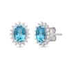 Thumbnail Image 1 of Oval Swiss Blue Topaz and 1/3 CT. T.W. Certified Lab-Created Diamond Sunburst Frame Stud Earrings in 14K White Gold