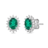 Thumbnail Image 1 of Oval Lab-Created Emerald and 1/3 CT. T.W. Certified Lab-Created Diamond Sunburst Frame Stud Earrings in 14K White Gold