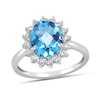 Thumbnail Image 1 of Oval Swiss Blue Topaz and 1/2 CT. T.W. Certified Lab-Created Diamond Sunburst Frame Ring in 14K White Gold (F/SI2)