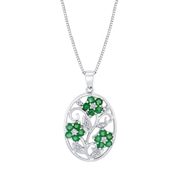 Emerald and 1/10 CT. T.W. Diamond Flower Vine Oval Pendant in Sterling Silver