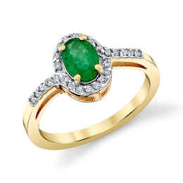 Oval Emerald and 1/5 CT. T.W. Diamond Bypass Ribbon Frame Ring in 10K Gold