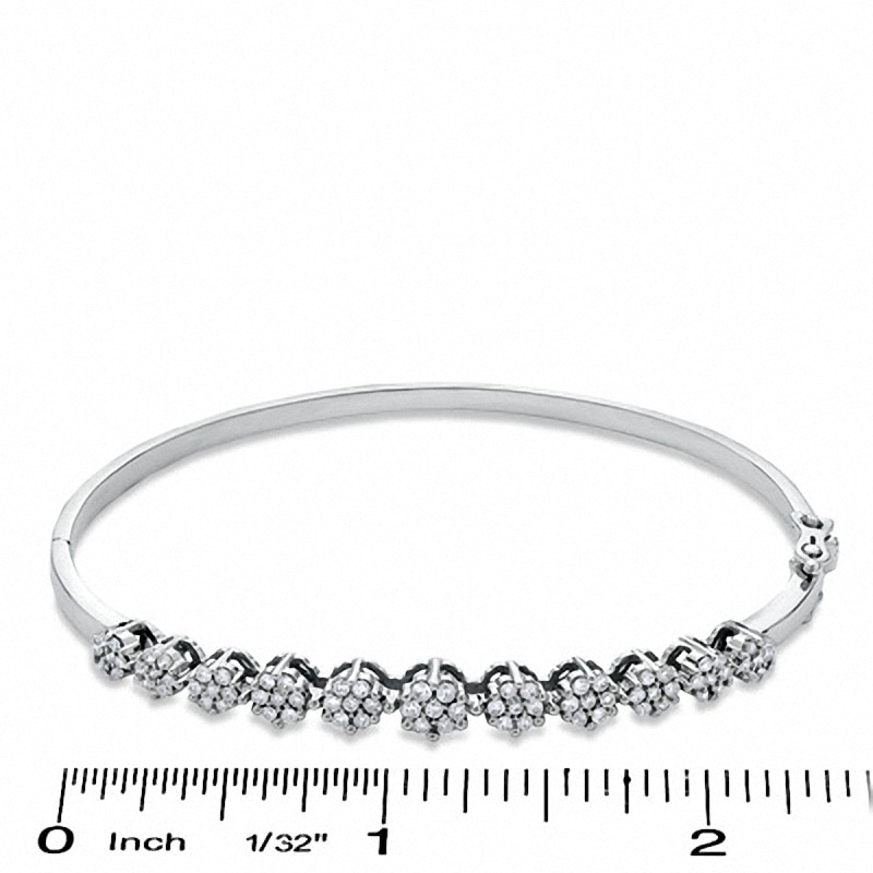 Previously Owned - 1 CT. T.W. Diamond Flower Bangle in 14K White Gold