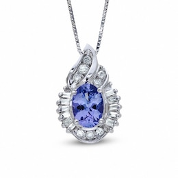 Previously Owned - Oval Tanzanite and 1/5 CT. T.W. Baguette and Round Diamond Pendant in 14K White Gold