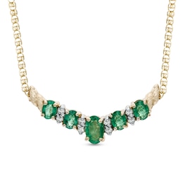 Previously Owned - Oval Emerald and 1/8 CT. T.W. Diamond Necklace in 14K Gold - 16&quot;