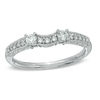 Thumbnail Image 1 of Previously Owned - 1/4 CT. T.W. Diamond Vintage-Style Contour Wedding Band in 14K White Gold