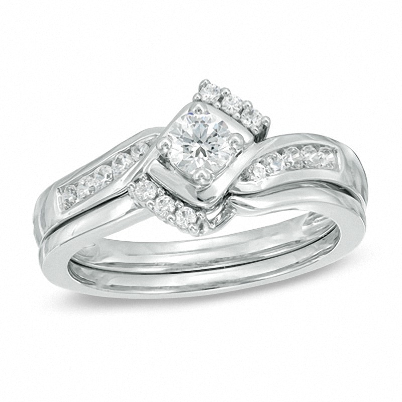 Previously Owned - 1/2 CT. T.W. Diamond Tri-Sides Bridal Set in 10K White Gold