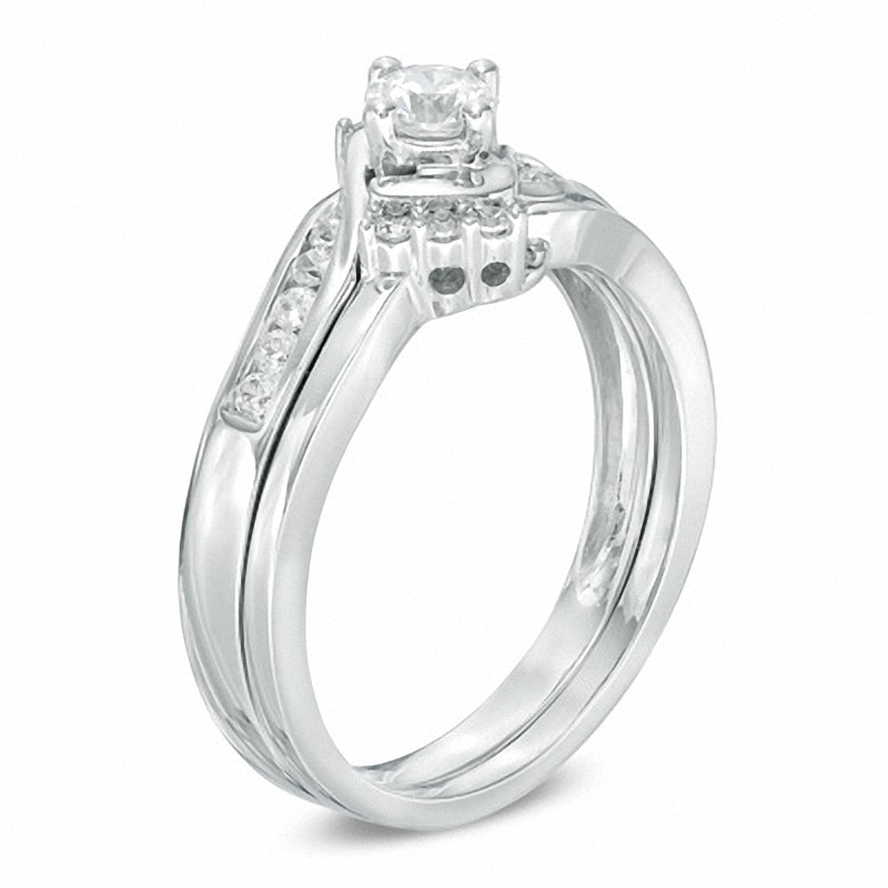 Previously Owned - 1/2 CT. T.W. Diamond Tri-Sides Bridal Set in 10K White Gold