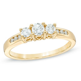 Previously Owned - 1/2 CT. T.W. Diamond Past Present Future® Ring in 14K Gold