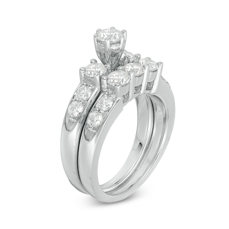 Previously Owned - 2 CT. T.W. Diamond Three Stone Bridal Set in 14K White Gold