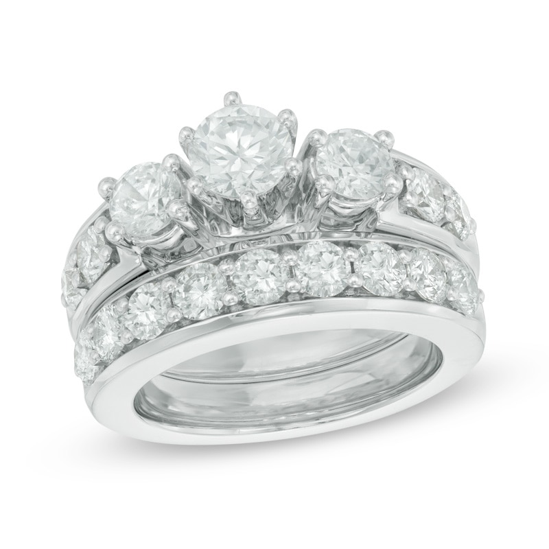 Main Image 1 of Previously Owned - 2-3/4 CT. T.W. Diamond Past Present Future® Bridal Set in 14K White Gold