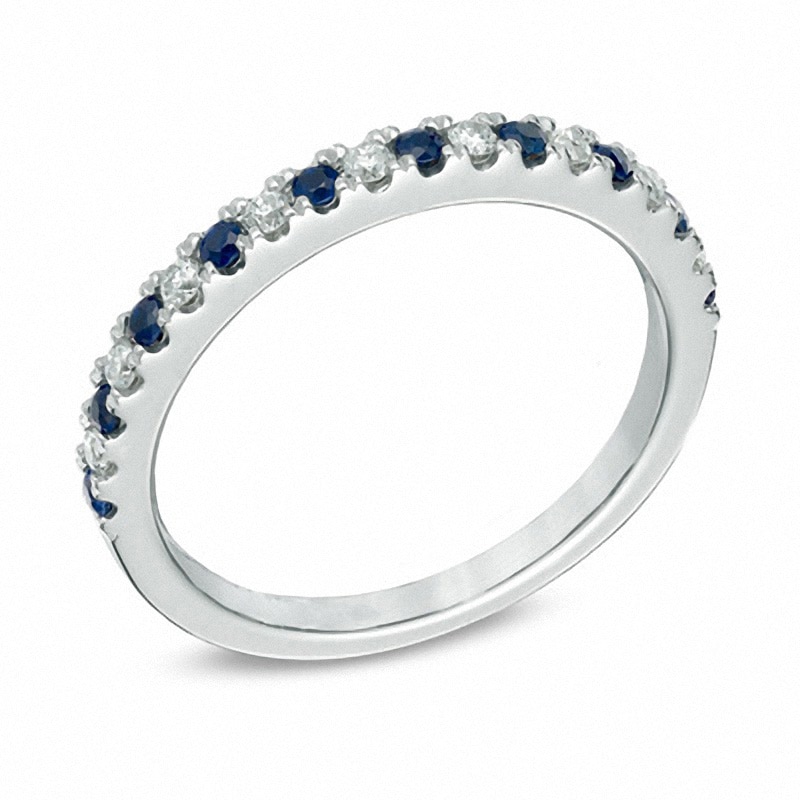 Previously Owned - Vera Wang Love Collection 1/8 CT. T.W. Diamond and Blue Sapphire Wedding Band in 14K White Gold