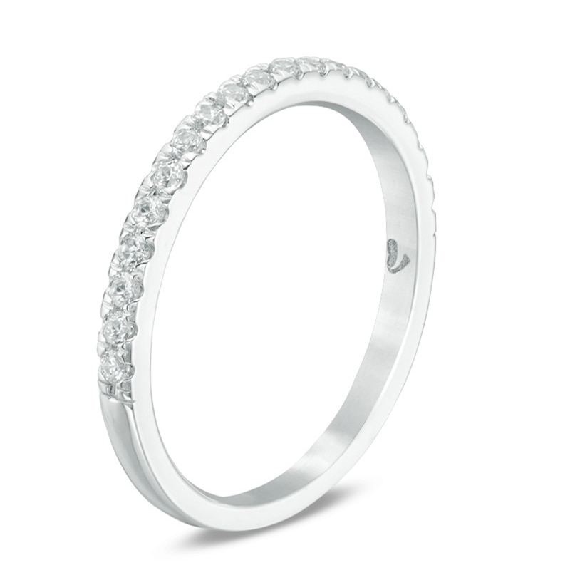 Previously Owned - Love's Destiny by Peoples 1/4 CT. T.W. Diamond Wedding Band in 14K White Gold (I/I1)