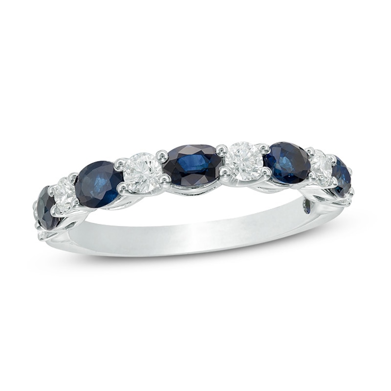 Previously Owned - Vera Wang Love Collection Oval Blue Sapphire and 3/8 CT. T.W. Diamond Band in 14K White Gold