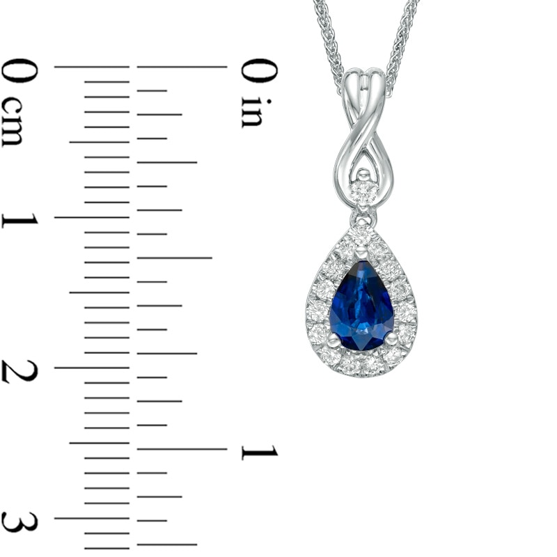 Previously Owned - Vera Wang Love Collection Blue Sapphire and 1/6 CT. T.W. Diamond Pendant in 14K White Gold - 19"