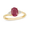 Thumbnail Image 0 of Previously Owned - Oval Ruby and 1/10 CT. T.W. Diamond Tri-Sides Ring in 10K Gold