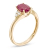Thumbnail Image 1 of Previously Owned - Oval Ruby and 1/10 CT. T.W. Diamond Tri-Sides Ring in 10K Gold