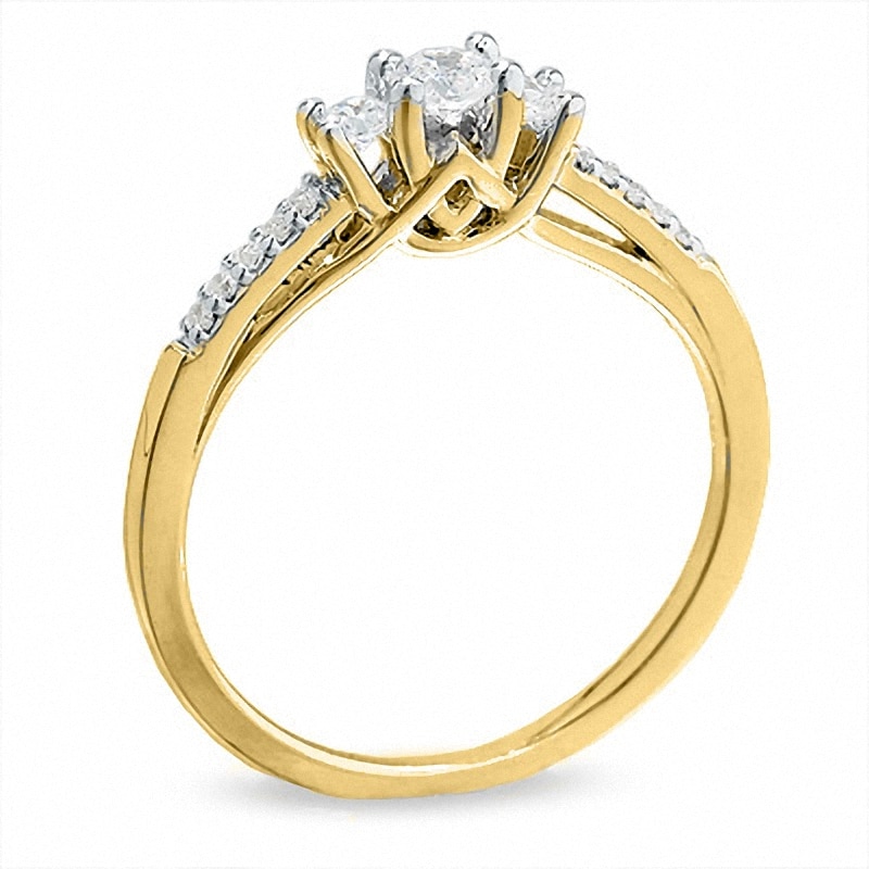 Previously Owned - 1/3 CT. T.W. Diamond Three Stone Ring in 10K Gold
