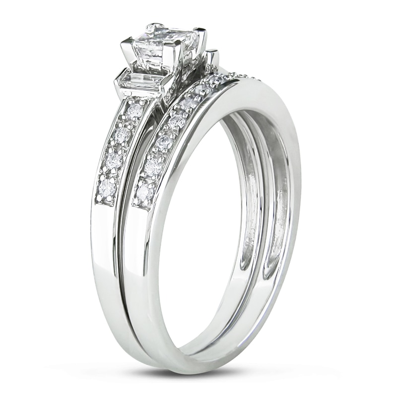 Previously Owned - 1/3 CT. T.W. Princess-Cut and Baguette Diamond Three Stone Bridal Set in Sterling Silver