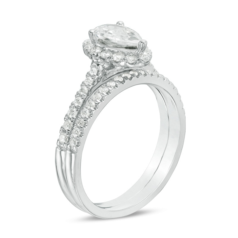 Previously Owned - 1-1/5 CT. T.W. Pear-Shaped Diamond Frame Bridal Set in 14K White Gold (I/SI2)