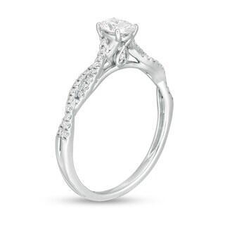 Previously Owned - 1/2 CT. T.W. Oval Diamond Twist Engagement Ring in ...