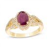 Thumbnail Image 1 of Previously Owned - Oval Ruby and 1/5 CT. T.W. Diamond Frame Scrolling Split Shank Ring in 10K Gold