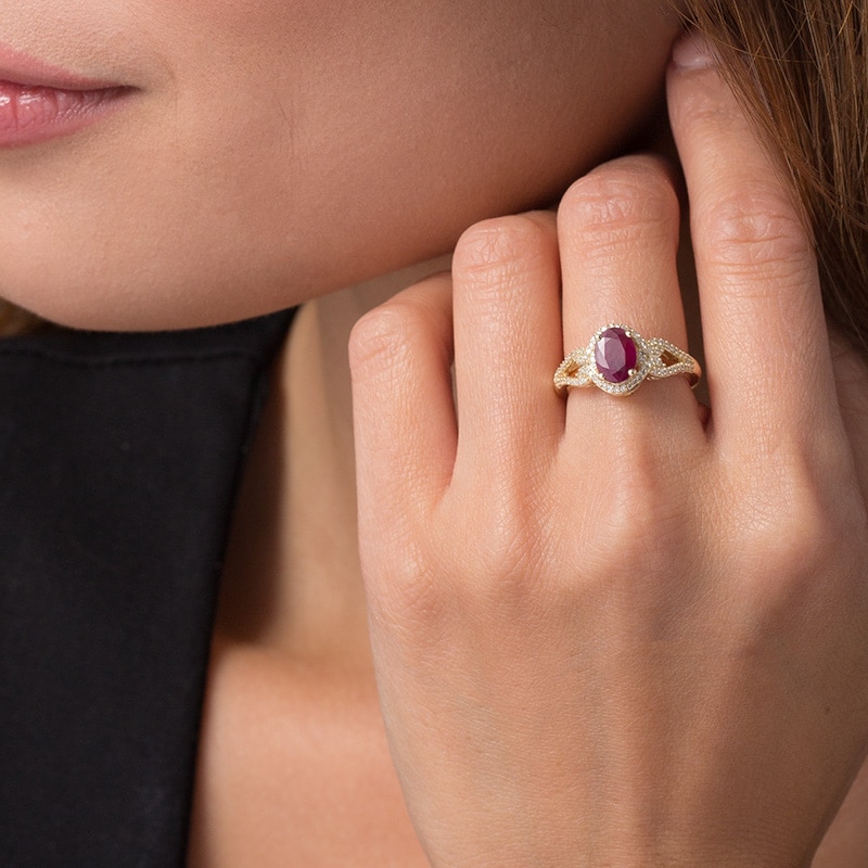 Main Image 2 of Previously Owned - Oval Ruby and 1/5 CT. T.W. Diamond Frame Scrolling Split Shank Ring in 10K Gold