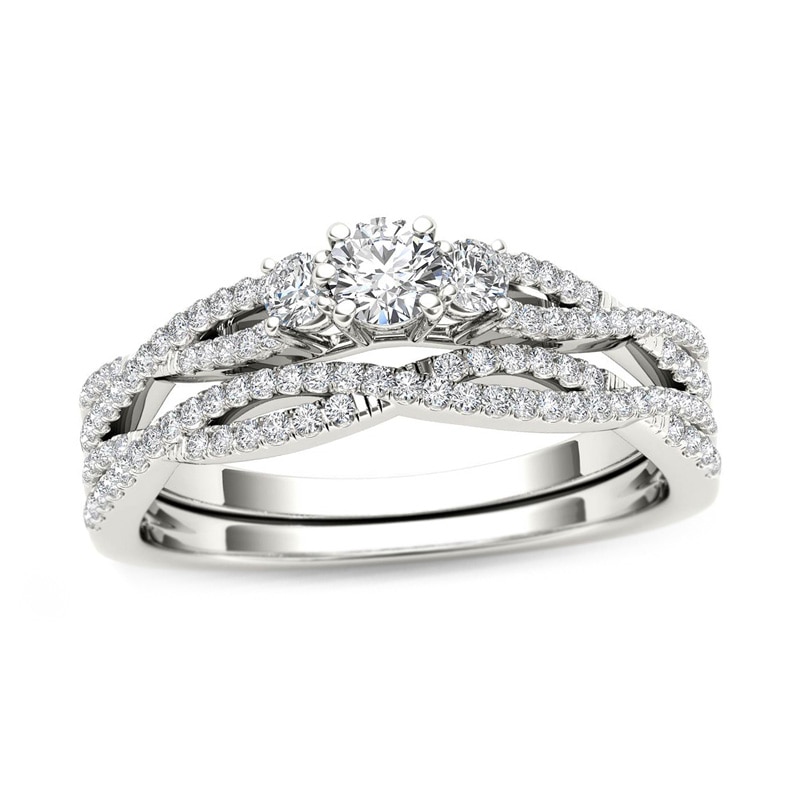 Main Image 1 of Previously Owned - 1/2 CT. T.W. Diamond Three Stone Twist Bridal Set in 14K White Gold