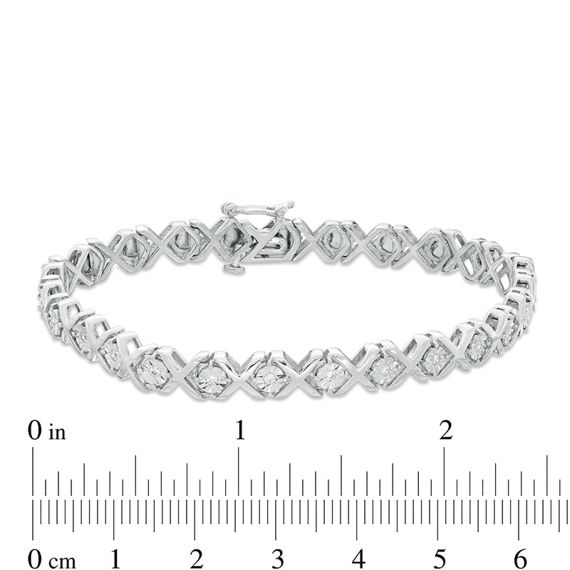 Previously Owned - 1/10 CT. T.W. Diamond "XO" Bracelet in Sterling Silver - 7.25"