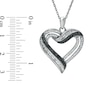 Thumbnail Image 1 of Previously Owned - 1/2 CT. T.W.  Black and White Diamond Heart Pendant in Sterling Silver