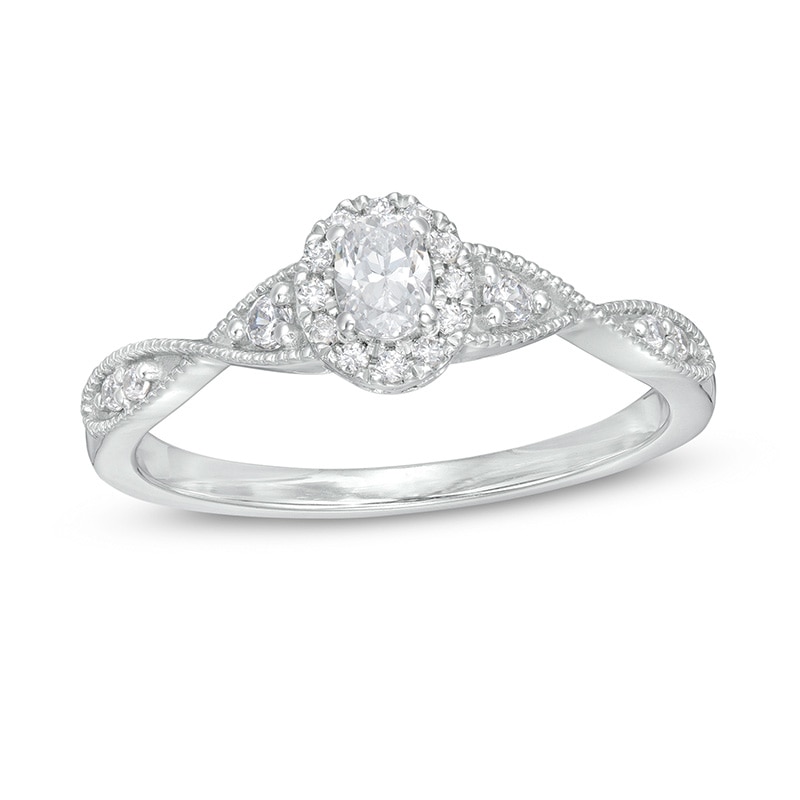 Main Image 1 of Previously Owned - 1/3 CT. T.W. Oval Diamond Frame Twist Shank Engagement Ring in 14K White Gold (I/SI2)