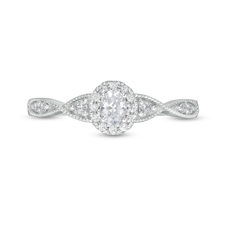 Main Image 4 of Previously Owned - 1/3 CT. T.W. Oval Diamond Frame Twist Shank Engagement Ring in 14K White Gold (I/SI2)