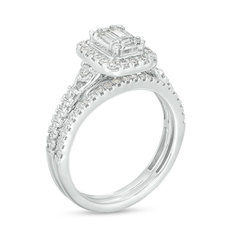 Main Image 2 of Previously Owned - 3/4 CT. T.W. Emerald-Shaped Multi-Diamond Frame Bridal Set in 10K White Gold (I/SI2)