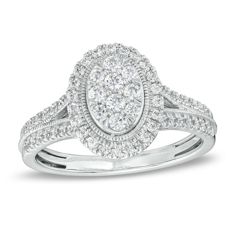 Previously Owned - 1/2 CT. T.W. Oval Multi-Diamond Frame Split Shank Engagement Ring in 10K White Gold