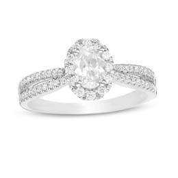 Previously Owned - 3/4 CT. T.W.  Oval Diamond Frame Engagement Ring in 14K White Gold (I/I2)