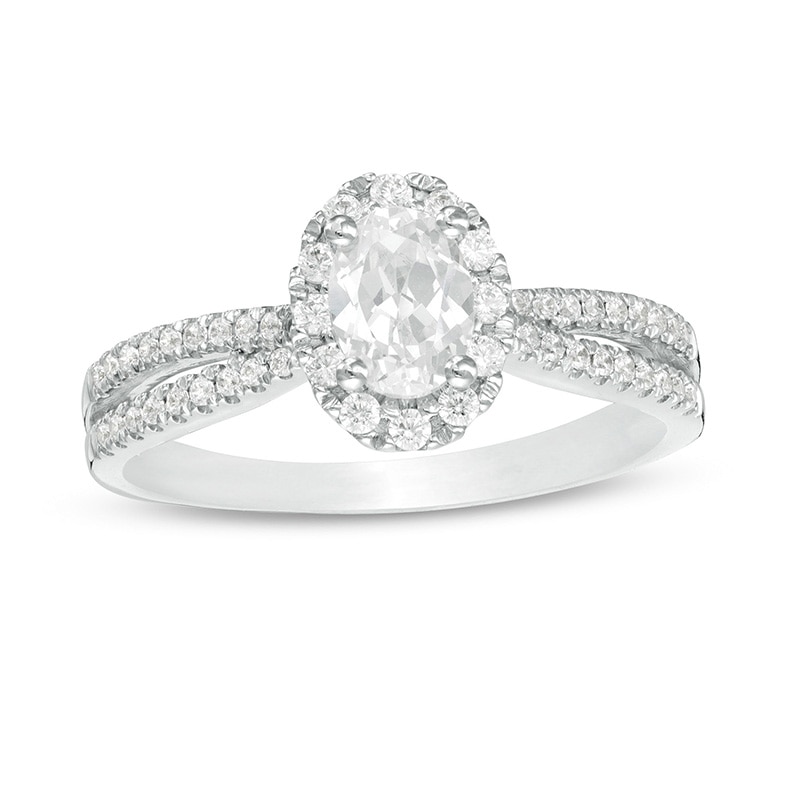 Main Image 1 of Previously Owned - 3/4 CT. T.W.  Oval Diamond Frame Engagement Ring in 14K White Gold (I/I2)