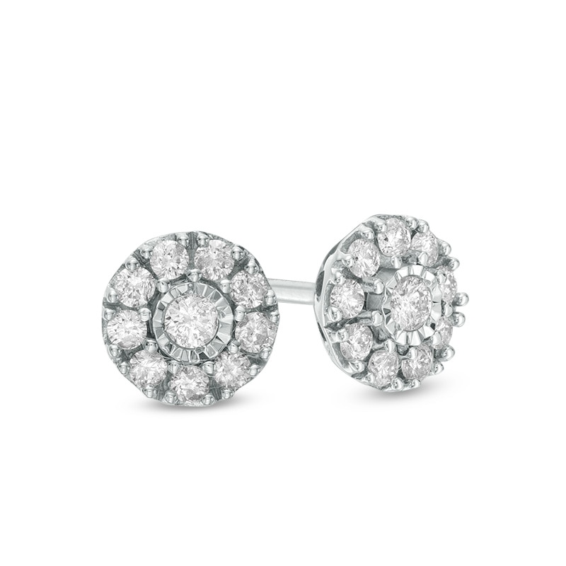 Previously Owned - 1/5 CT. T.W. Diamond Frame Flower Stud Earrings in 10K White Gold