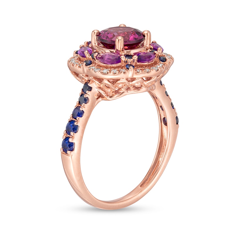 Previously Owned - Rhodolite Garnet, Garnet, Blue Sapphire and 1/8 CT. T.W. Diamond Frame Flower Ring in 14K Rose Gold