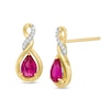 Thumbnail Image 1 of Previously Owned - Pear-Shaped Lab-Created Ruby and 1/20 CT. T.W. Diamond Cascading Teardrop Earrings in 10K Gold