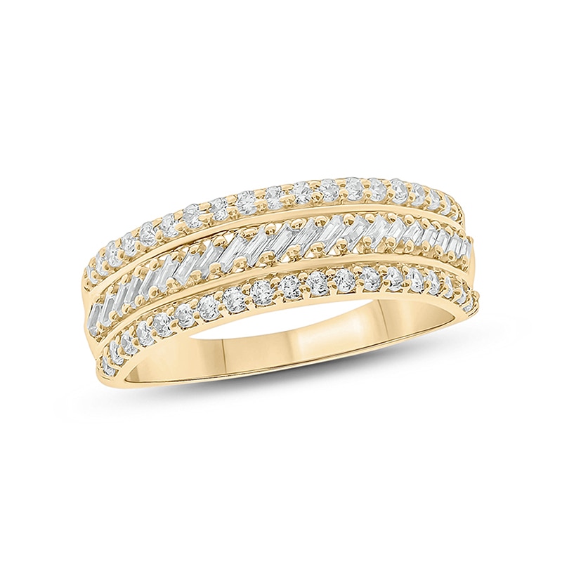 Previously Owned - 1/2 CT. T.W. Baguette and Round Diamond Slant Stripe Anniversary Band in 10K Gold