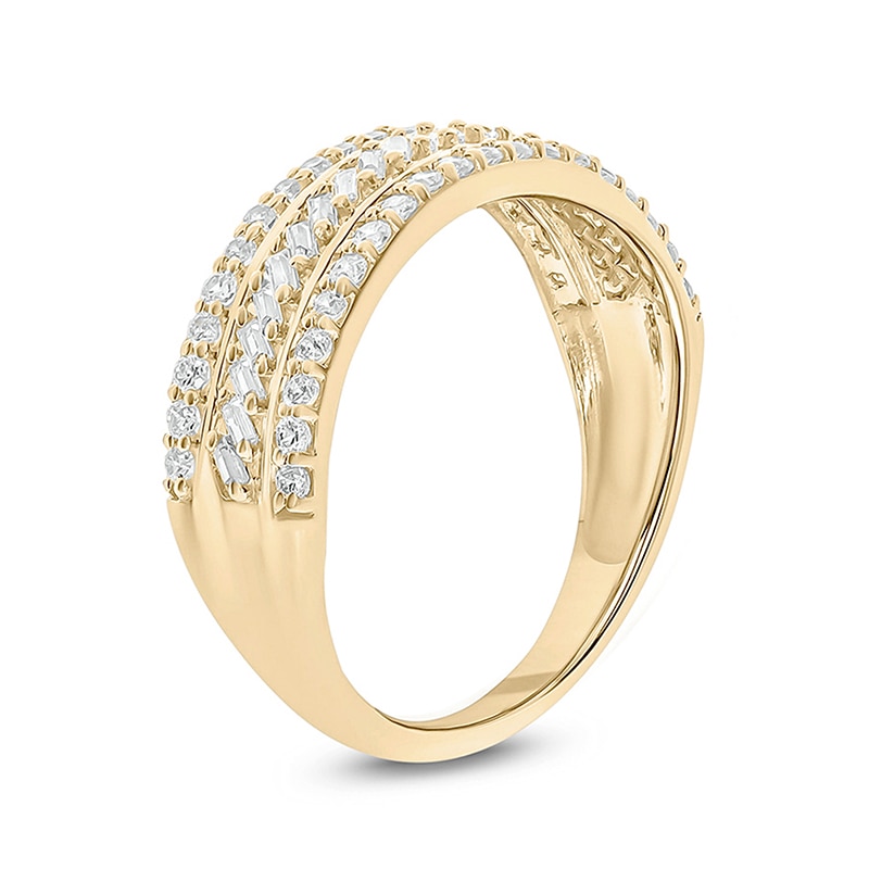 Previously Owned - 1/2 CT. T.W. Baguette and Round Diamond Slant Stripe Anniversary Band in 10K Gold
